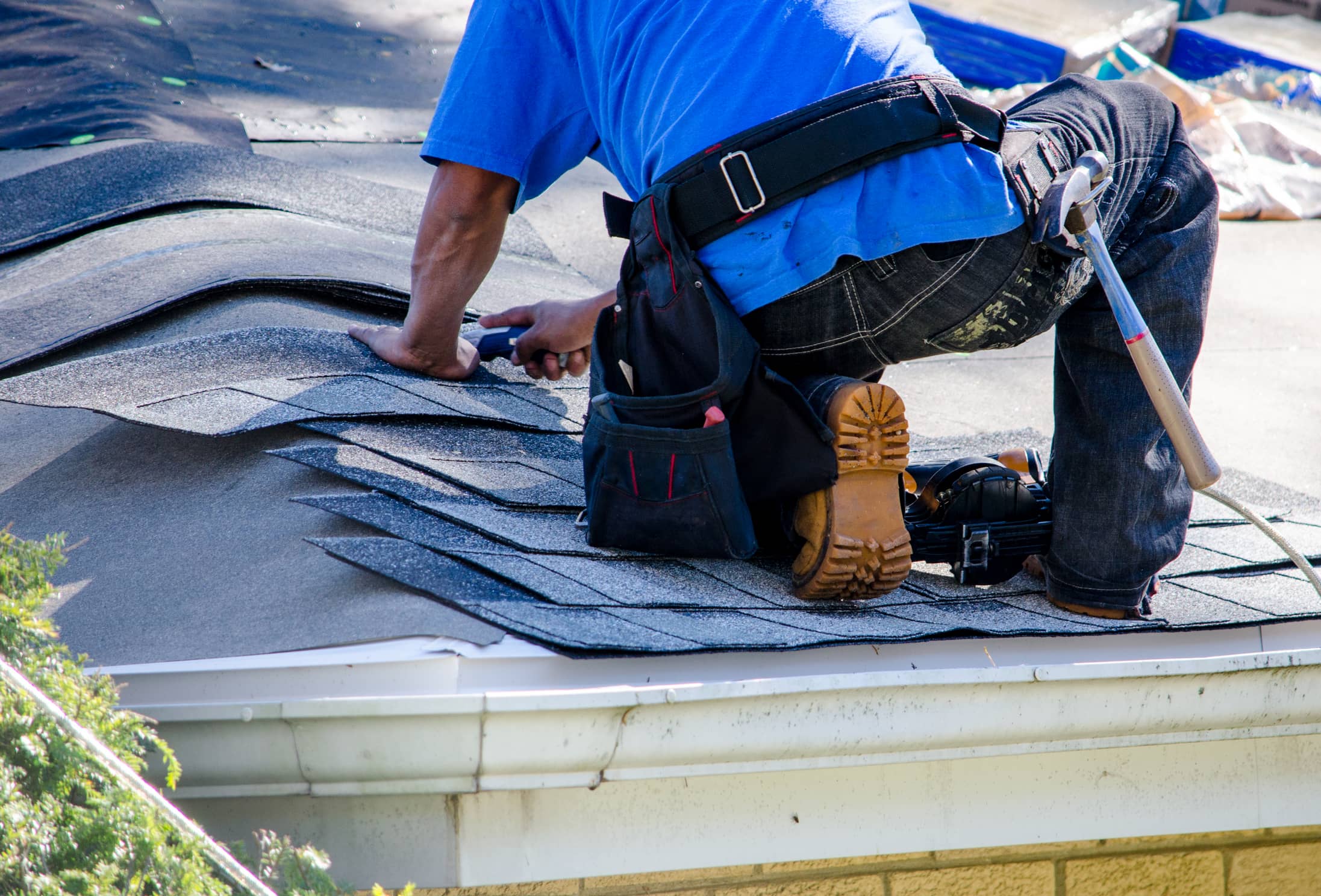 This is an image of a roof replacement on a residential house.